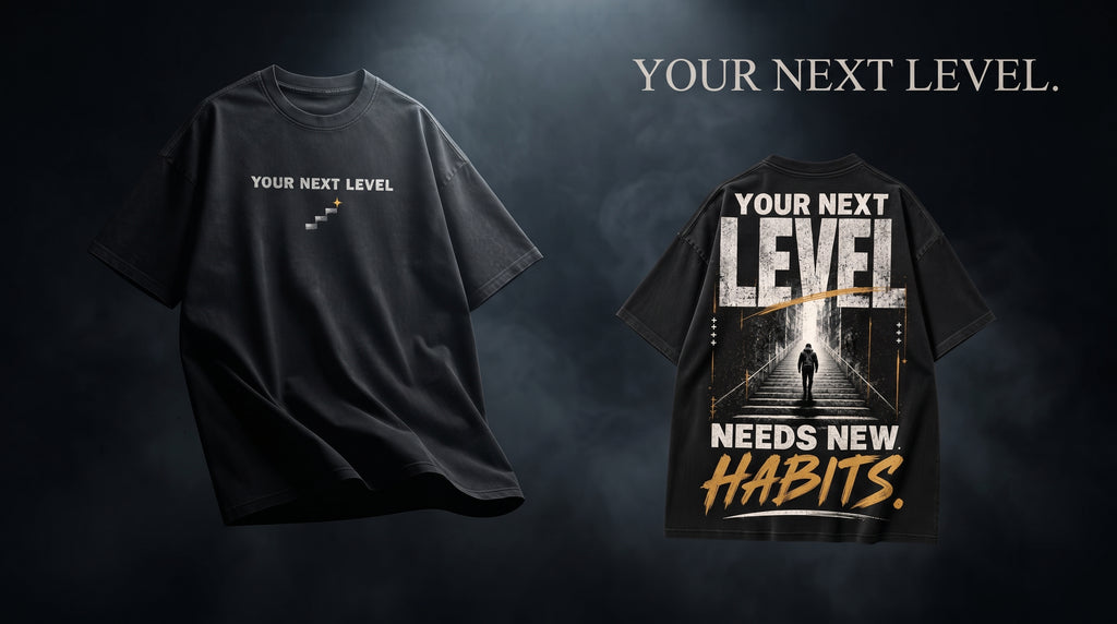 Black oversized t-shirt with 'Your Next Level' chest print and staircase icon design
